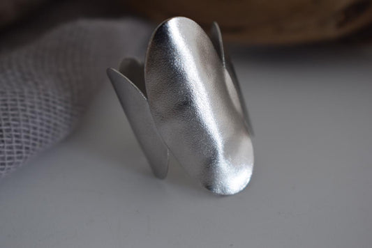 Delos ring Greek hammered jewelry with oval double-disc design, available in gold, silver, and rose gold plated.