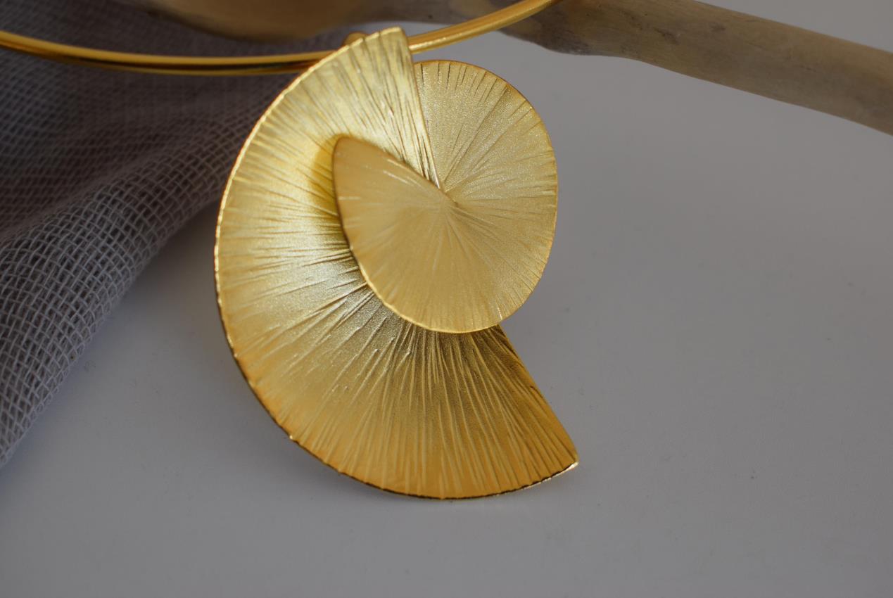 Kochlias necklace Greek hammered jewelry spiral seashell design in 18K gold, silver, and rose gold plated finish.