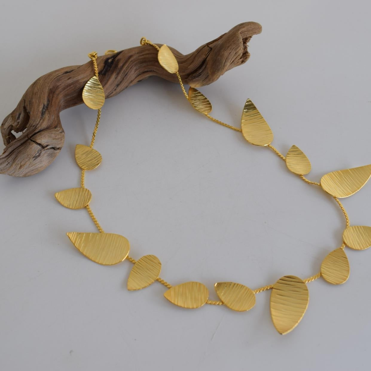 Noufaro Necklace – Handmade Greek hammered jewelry inspired by the sacred water lily, available in 18K gold or silver plated.
