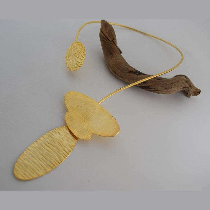 Nausicaa Necklace – Handmade Greek hammered jewelry inspired by the sea, available in 18K gold or silver plated finish.