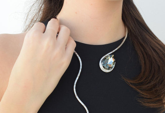 Aigle Necklace – Handmade Greek hammered jewelry with Swarovski crystal drop, available in 18K gold or silver plated finish.