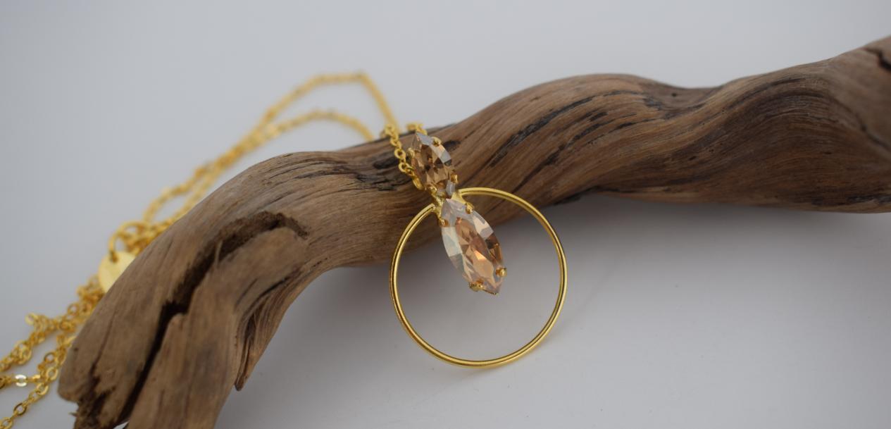 Helike Necklace – handmade Greek hammered jewelry with Swarovski crystal and circular pendant, available in 18K gold, silver, and rose gold plated.