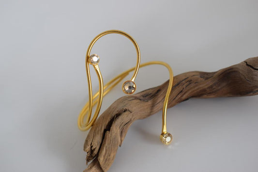 Tinos bracelet, handmade Greek hammered jewelry in 18K gold or silver plated with crystal stones on an open cuff design.