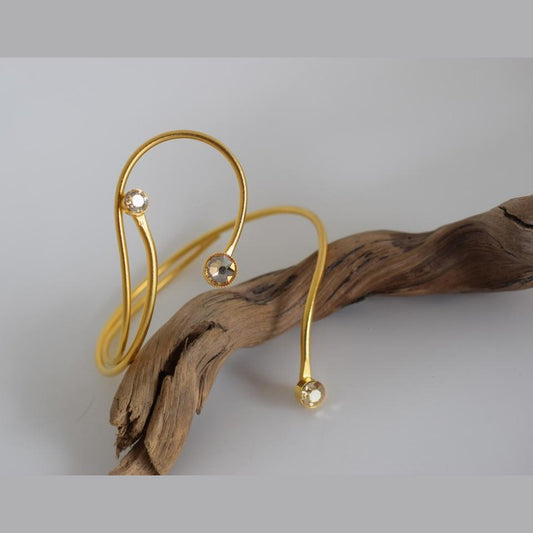 Tinos bracelet, handmade Greek hammered jewelry in 18K gold or silver plated with crystal stones on an open cuff design.