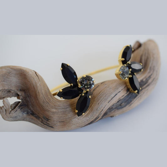 Amaryllis Bracelet – handmade Greek hammered jewelry with blue Swarovski crystals, available in 18K gold or silver plated.