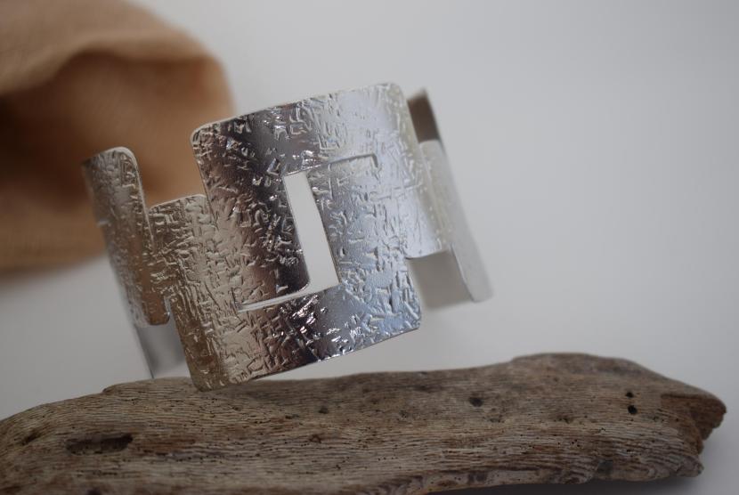 Labyrinthos Bracelet – handmade Greek hammered jewelry inspired by the ancient Labyrinth of Crete, available in 18K gold or silver plated.