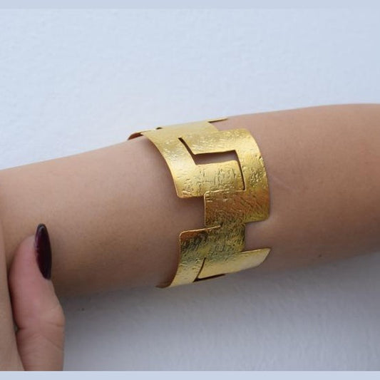 Labyrinthos Bracelet – handmade Greek hammered jewelry inspired by the ancient Labyrinth of Crete, available in 18K gold or silver plated.