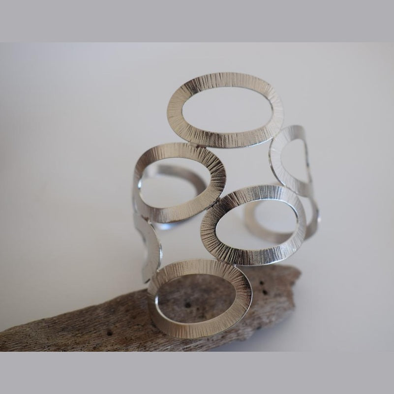 Handmade Rhodes bracelet, Greek hammered jewelry in 18K gold or silver plated with sculptural interlocking openwork design.