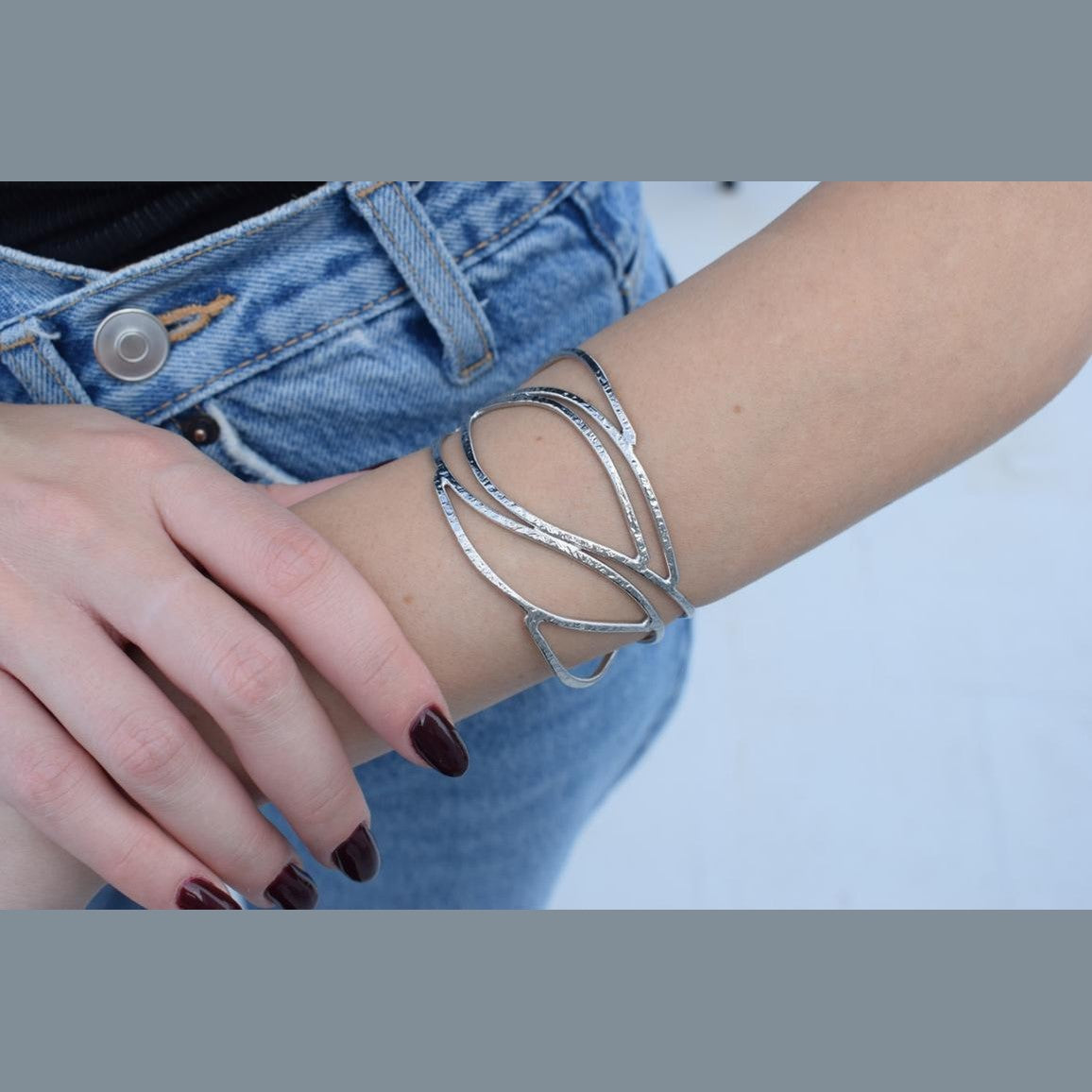 Handmade Narkissos bracelet, Greek hammered jewelry in 18K gold or silver plated with interwoven sculptural openwork design.