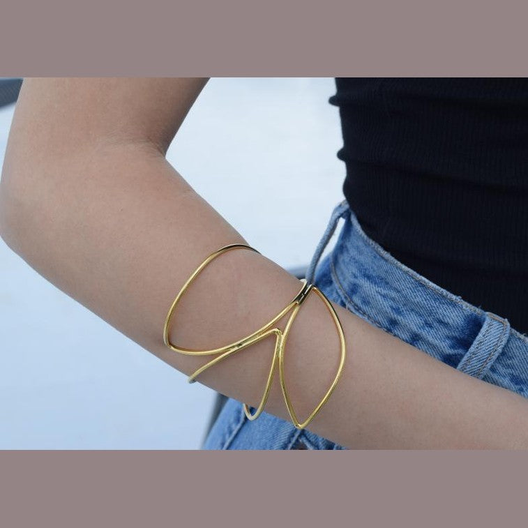 Nereis Bracelet – Handmade Greek Hammered Jewelry in gold or silver plated with elegant open-wave design inspired by sea nymphs.