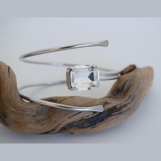 andmade Axon bracelet, Greek hammered jewelry in 18K gold or silver plated featuring a single Swarovski crystal on a sculptural open cuff.