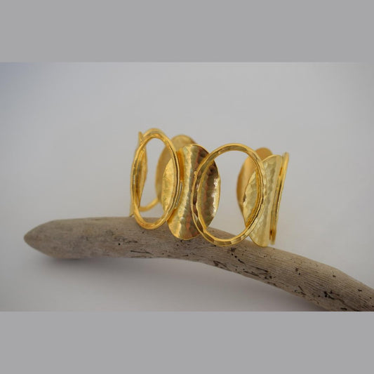 Handmade Andromeda bracelet, Greek hammered jewelry in 18K gold or silver plated with interlocking sculptural oval elements.