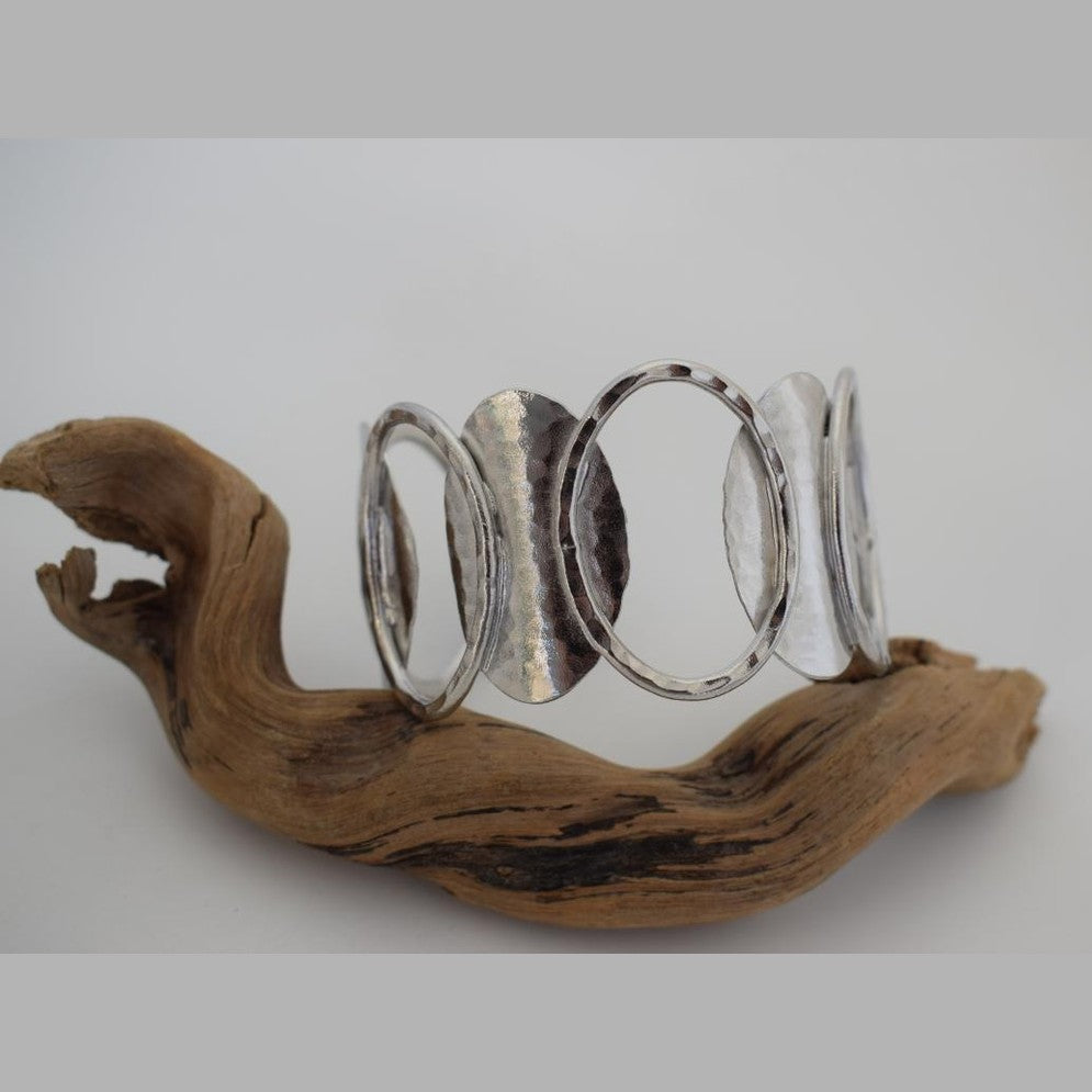 Handmade Andromeda bracelet, Greek hammered jewelry in 18K gold or silver plated with interlocking sculptural oval elements.