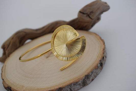 Handmade Noufaro bracelet, Greek hammered jewelry in 18K gold or silver plated with sculptural double-disc design.