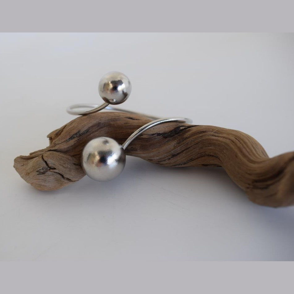 Handmade Sphaira bracelet, Greek hammered jewelry in 18K gold or silver plated with two sculptural spherical elements.