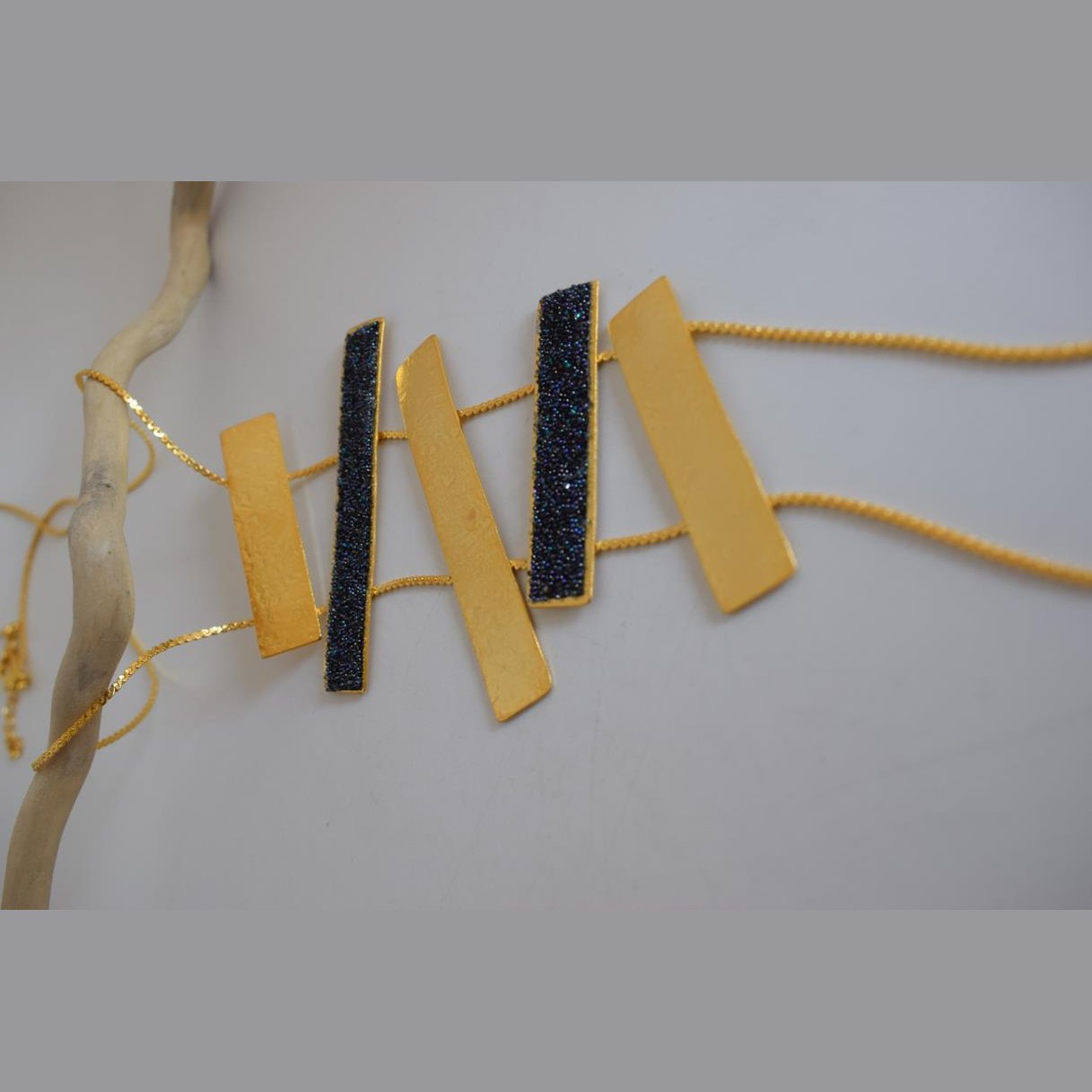 Ravdos necklace – Greek hammered jewelry available in 18K gold plated, 18K silver plated, and rose gold plated versions, adorned with striking black crystal inlays.