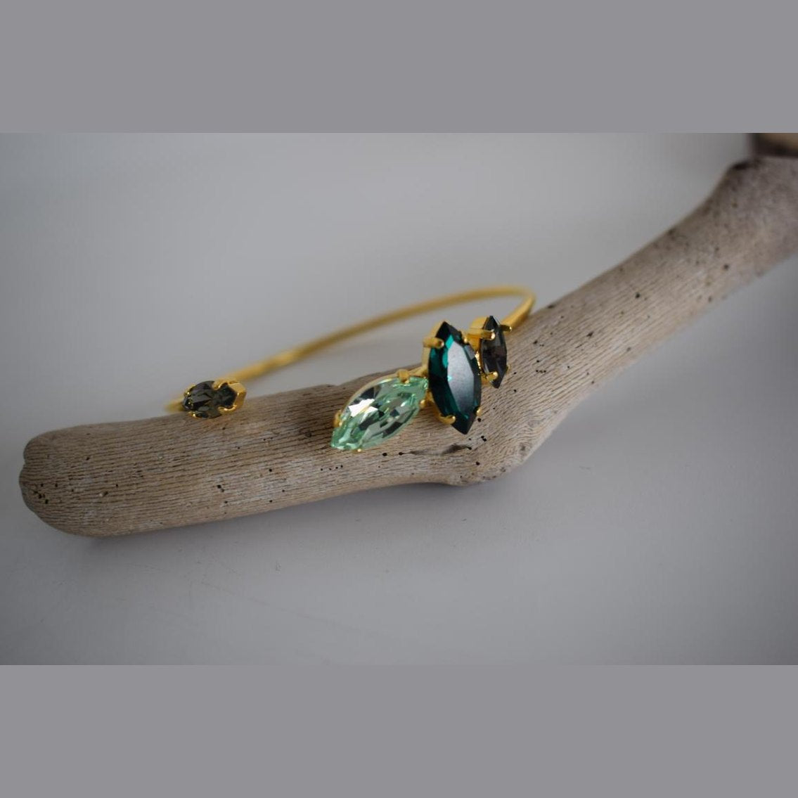 Helike bracelet, handmade Greek hammered jewelry with marquise Swarovski crystals in blue or champagne, 18K gold plated open cuff.