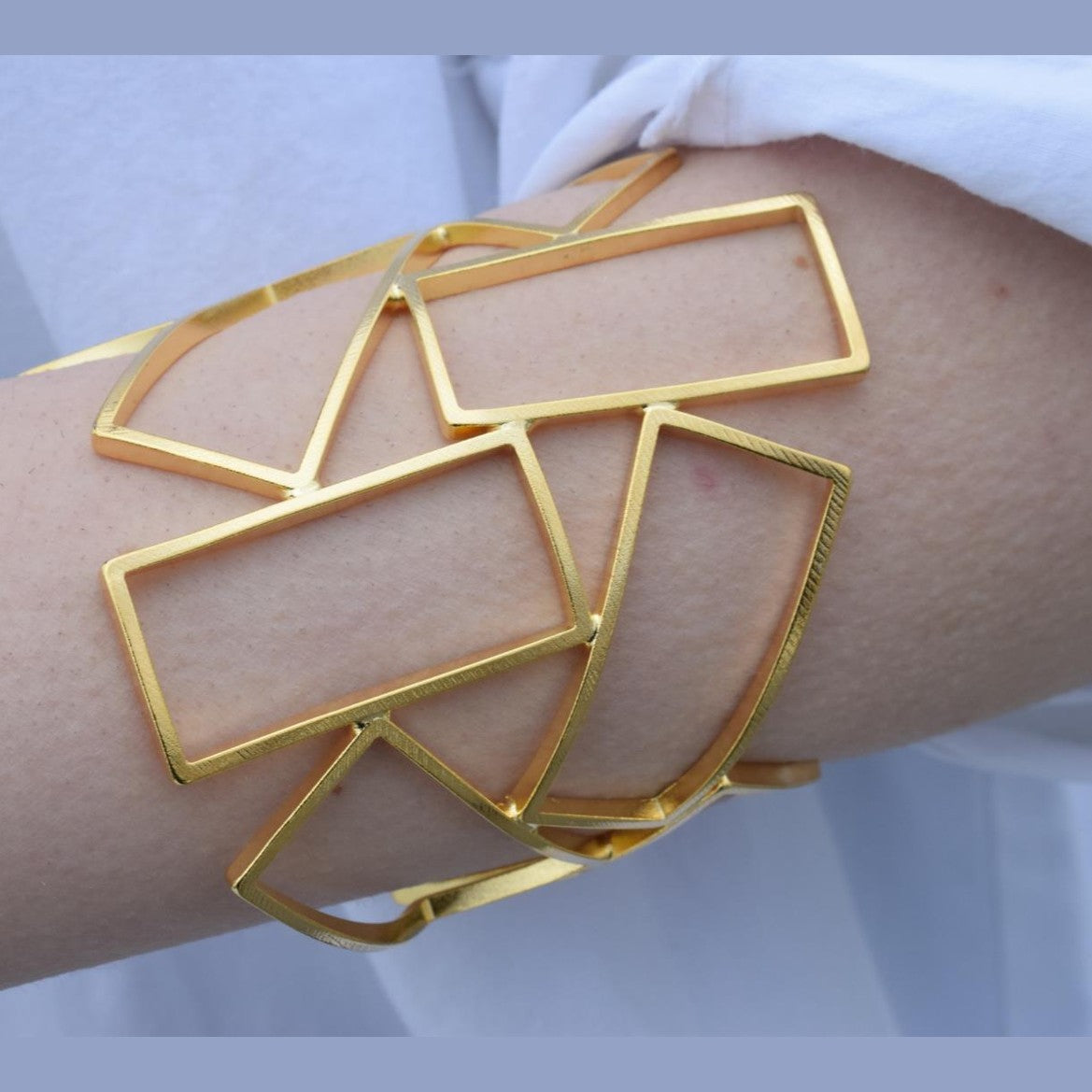 Geometria bracelet – Greek hammered jewelry – 18K gold or silver plated, also available in rose gold, interlocking rectangular cuff design