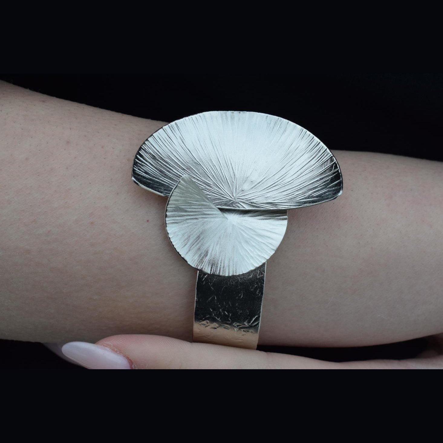 Kochlias bracelet Greek hammered jewelry spiral seashell design in 18K gold, silver, and rose gold plated finish.