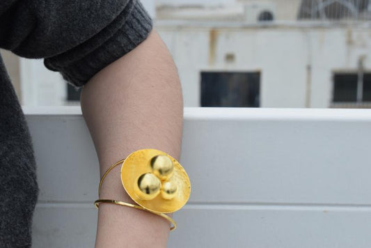 Atlas bracelet Greek hammered jewelry in 18K gold, silver, and rose gold plated with celestial sphere design