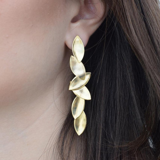 Elaia 4 cascading olive-leaf earrings, handmade Greek hammered jewelry, available in gold or silver plated.