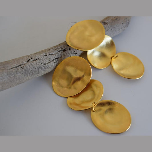 Heliades earrings in handmade Greek hammered jewelry design, available in 18K gold plated and 18K silver plated.