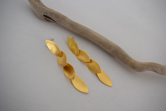 Elaia earrings in handmade Greek hammered jewelry design, available in 18K gold plated and 18K silver plated.