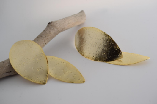 Nymphe Earrings – Greek Hammered Jewelry – Available in 18K Gold, Silver, and Rose Gold Plated. Handmade elongated hammered leaf-inspired design, symbolizing the grace of ancient nymphs.