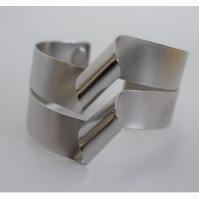 Delos Bracelet – Greek Hammered Jewelry – Available in 18K Gold, Silver, and Rose Gold Plated. Bold geometric interlocking design inspired by the sacred island of Delos.