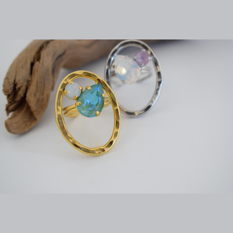 Amaryllis Ring – Greek Hammered Jewelry – Available in 18K Gold, Silver, and Rose Gold Plated With Crystal. Handmade hammered oval design with crystal drop centerpiece, inspired by the ancient Greek flower Amaryllis.