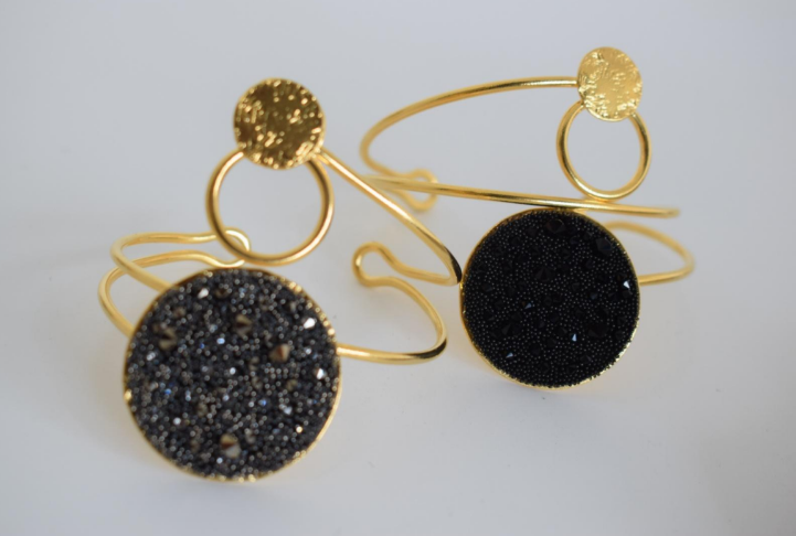 Handmade open cuff bracelet with Swarovski-studded disc inspired by the Milky Way, available in gold, silver, or rose gold plating.