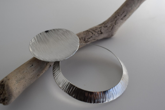 Krateras Earrings – Greek Hammered Jewelry – Available in 18K Gold, Silver, and Rose Gold Plated. Hammered circle design inspired by Greek volcanic craters.