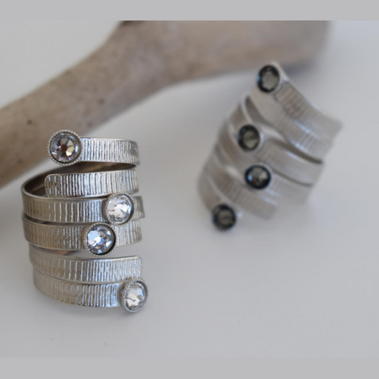 Aetheras Ring – Greek Hammered Jewelry – Available in 18K Gold, Silver, and Rose Gold Plated With Crystal. Spiral hammered design, adjustable, hypoallergenic, handcrafted.