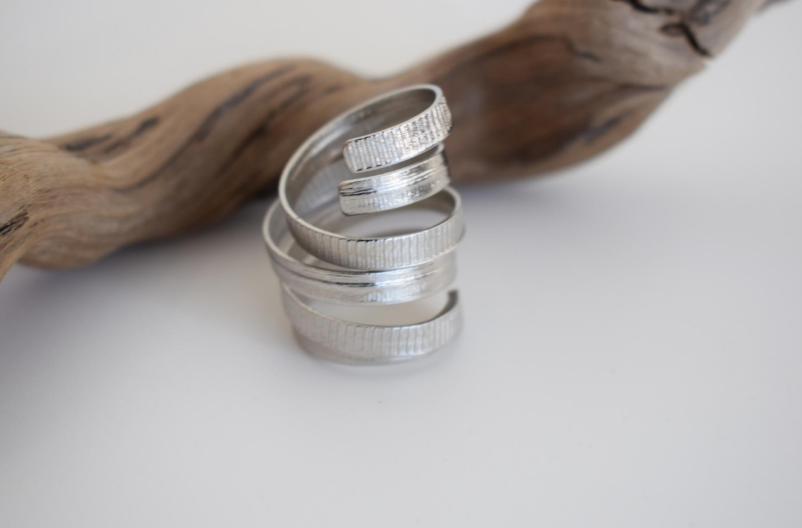 Helion Ring – Greek Hammered Jewelry – Available in 18K Gold, Silver, and Rose Gold Plated. Handmade spiral hammered design inspired by the ancient Greek sun symbol.