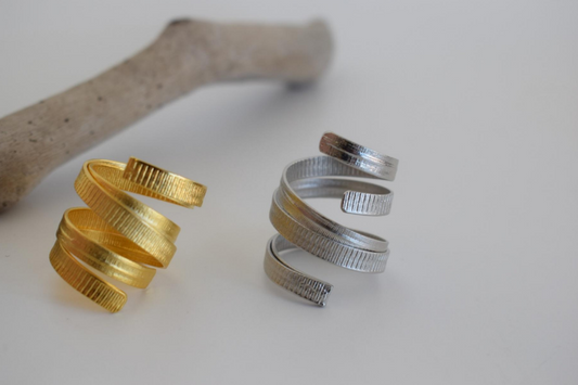 Helion Ring – Greek Hammered Jewelry – Available in 18K Gold, Silver, and Rose Gold Plated. Handmade spiral hammered design inspired by the ancient Greek sun symbol.