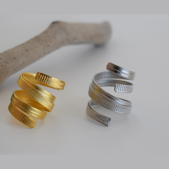 Helion Ring – Greek Hammered Jewelry – Available in 18K Gold, Silver, and Rose Gold Plated. Handmade spiral hammered design inspired by the ancient Greek sun symbol.