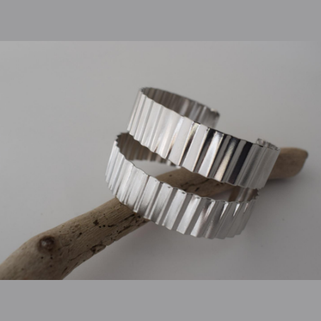 Rythmos Bracelet – Greek Hammered Jewelry – Available in 18K Gold, Silver, and Rose Gold Plated. Hammered vertical lines inspired by rhythm and ancient columns.