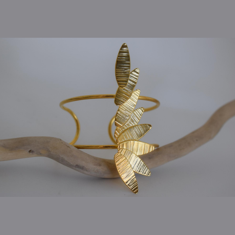 Handmade gold or silver plated cuff bracelet with elongated textured olive leaf design, inspired by ancient Greek olive branches