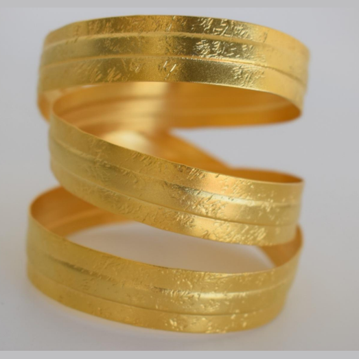 Labrys bracelet in 18K gold or silver plated Greek hammered cuff design, inspired by the Minoan double axe and labyrinth mythology.