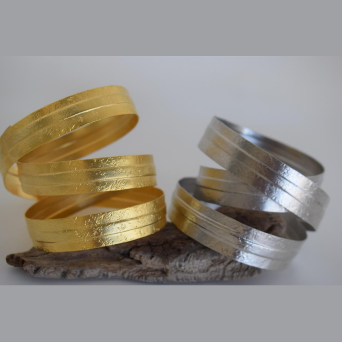 Labrys bracelet in 18K gold or silver plated Greek hammered cuff design, inspired by the Minoan double axe and labyrinth mythology.