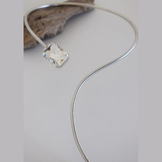 Handmade open choker necklace with a Swarovski crystal inspired by shimmering silver waters in ancient Greek culture, available in gold, silver, or rose gold plating.
