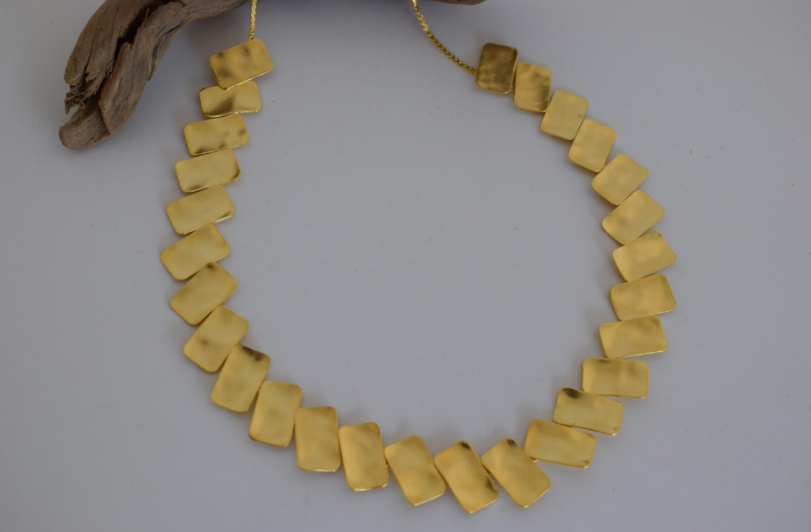 Handmade hammered necklace with rectangular gold-plated plates inspired by the poetic elegance of gold in ancient Greek culture.