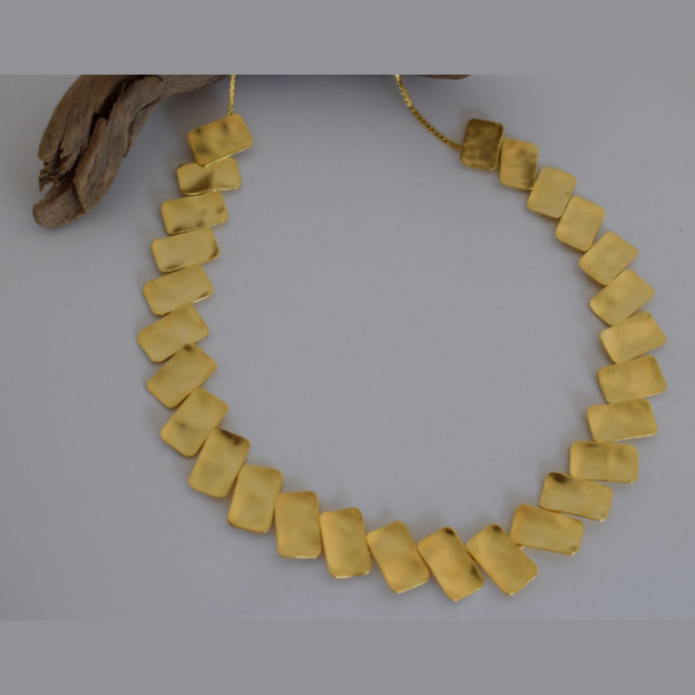 Handmade hammered necklace with rectangular gold-plated plates inspired by the poetic elegance of gold in ancient Greek culture.