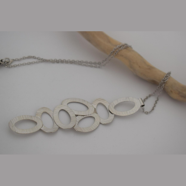 Handcrafted Amphora necklace, Greek hammered jewelry, silver plated, vertical graduated oval cut-out design