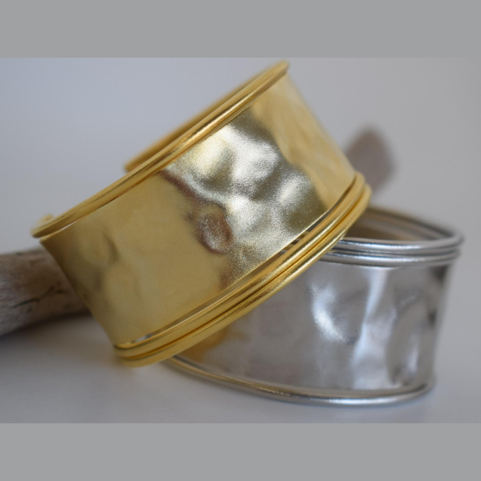 Handmade wide hammered cuff bracelet in 18k gold plated and silver plated finish, inspired by the ancient Greek Aegis