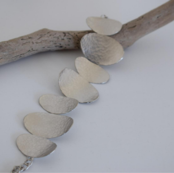 Handmade hammered disc bracelet in 18k gold plated finish, inspired by ancient Greek design