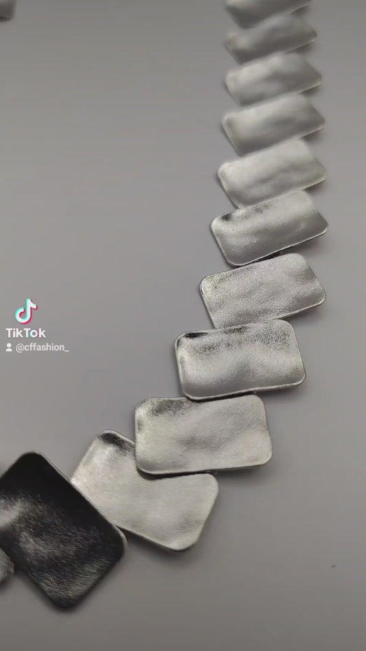 Handmade hammered necklace with rectangular gold-plated plates inspired by the poetic elegance of gold in ancient Greek culture.