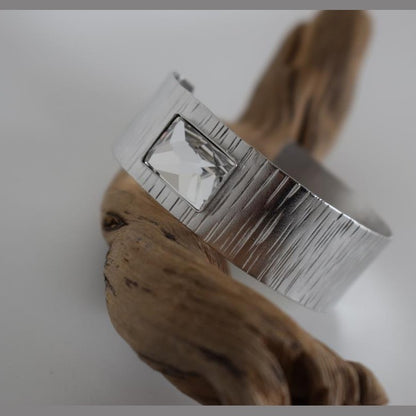  Inspired by Ionian columns and sea. 18K gold, silver, crystals