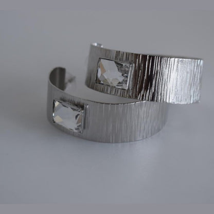  Inspired by Ionian columns and sea. 18K gold, silver, crystals