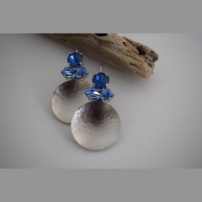Santorini earrings with crystal – Greek hammered jewelry in 18K gold plated, 18K silver plated, and rose gold plated. Handcrafted earrings with hammered discs and sparkling crystals inspired by the island of Santorini.